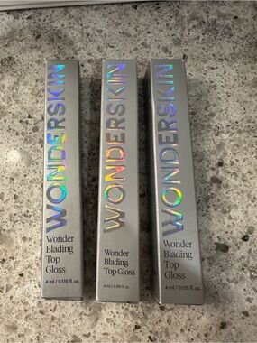 Wonderskin Wonder Blading Top Gloss in shades Red, Gold & Silver Glitter